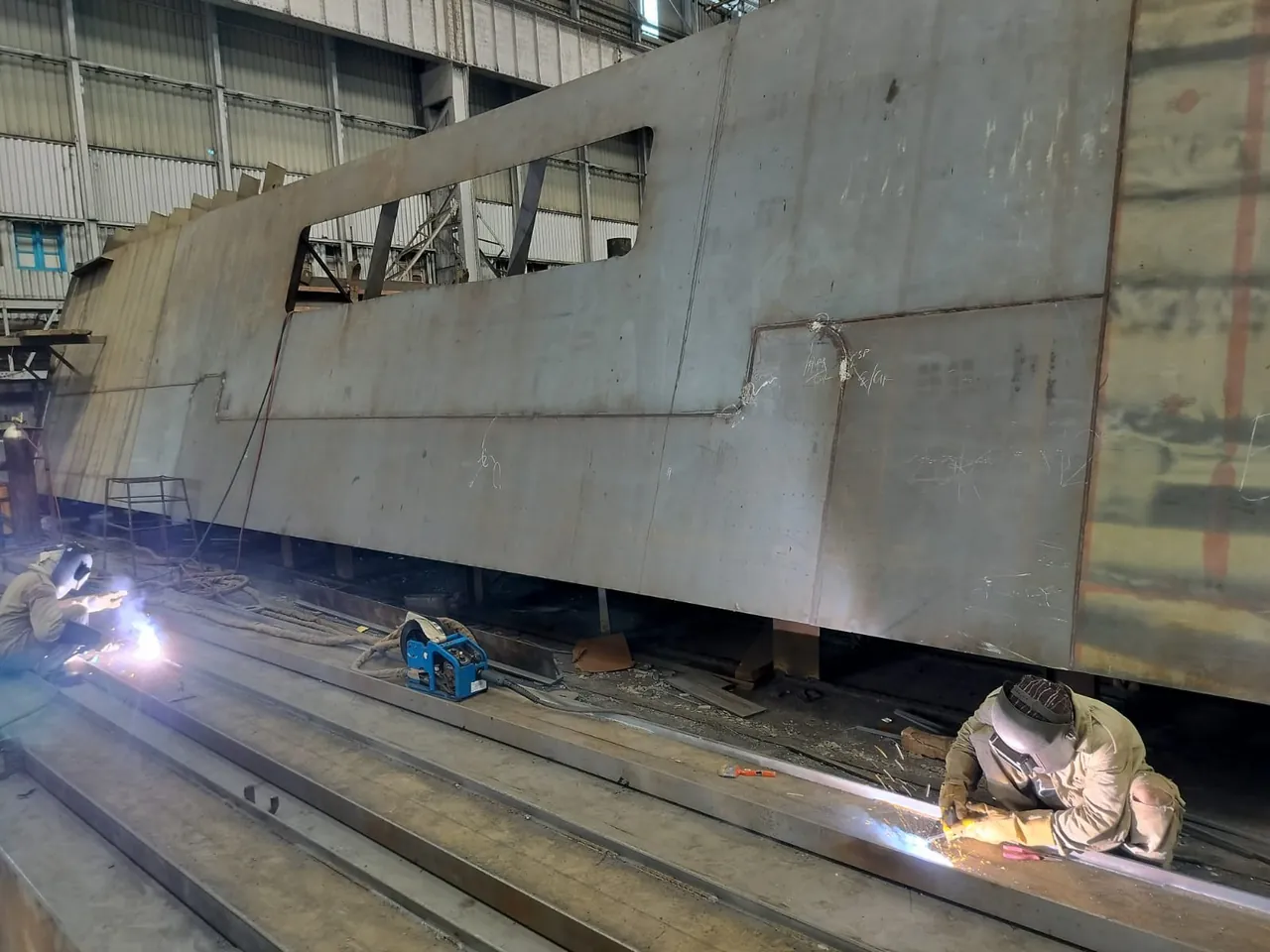 Welding work inside a shipbuilding block.