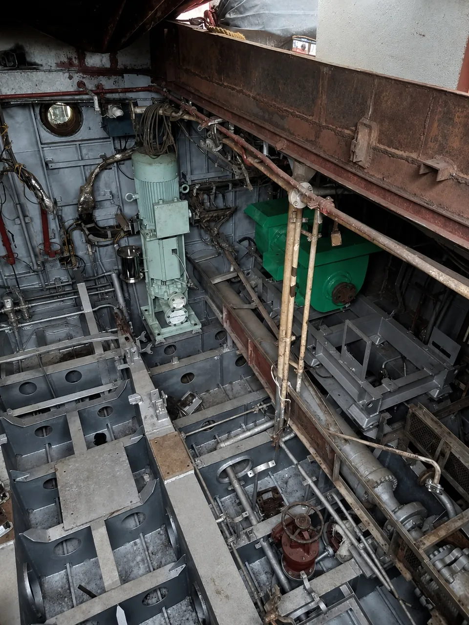 Machinery space de-gutted for hull inspection and structural repair before reinstatement.