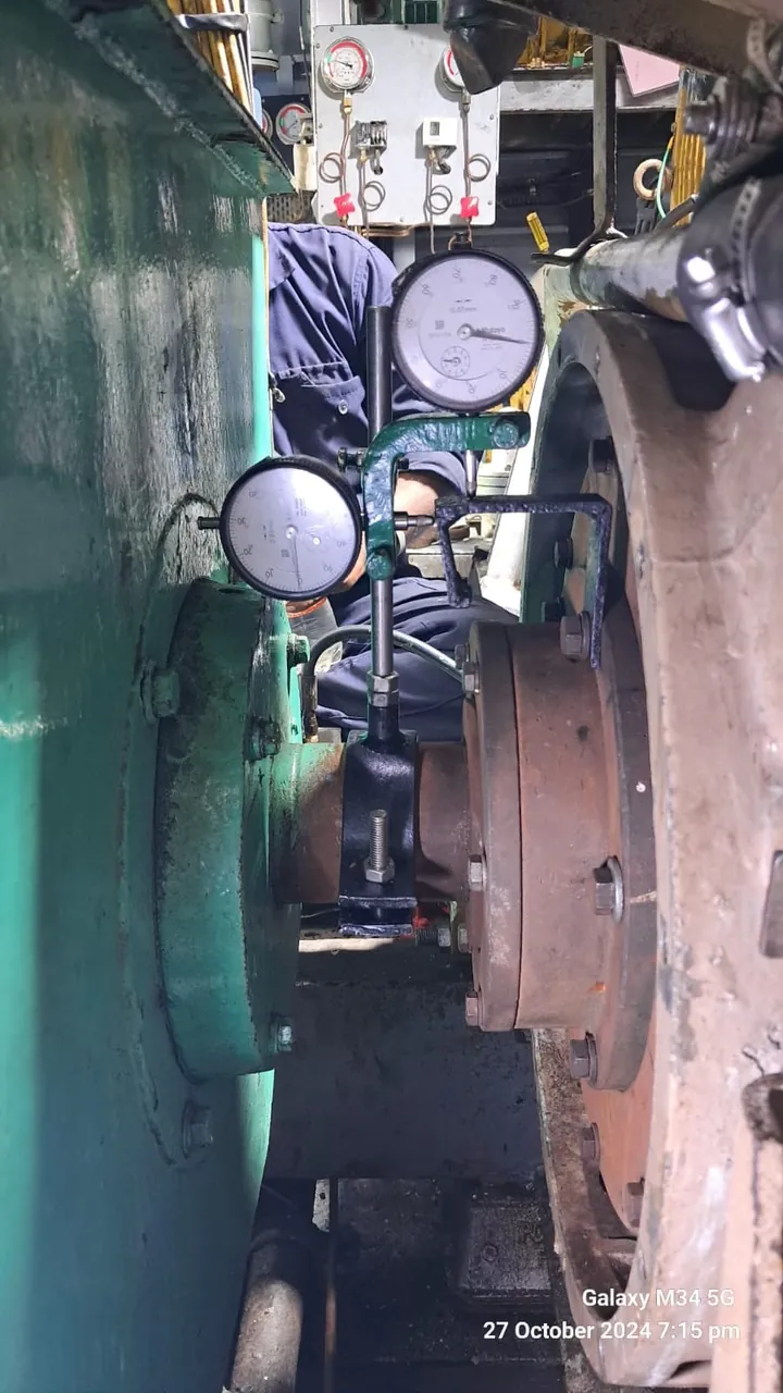 Dial-gauge alignment work during machinery installation onboard INS Car Nicobar.