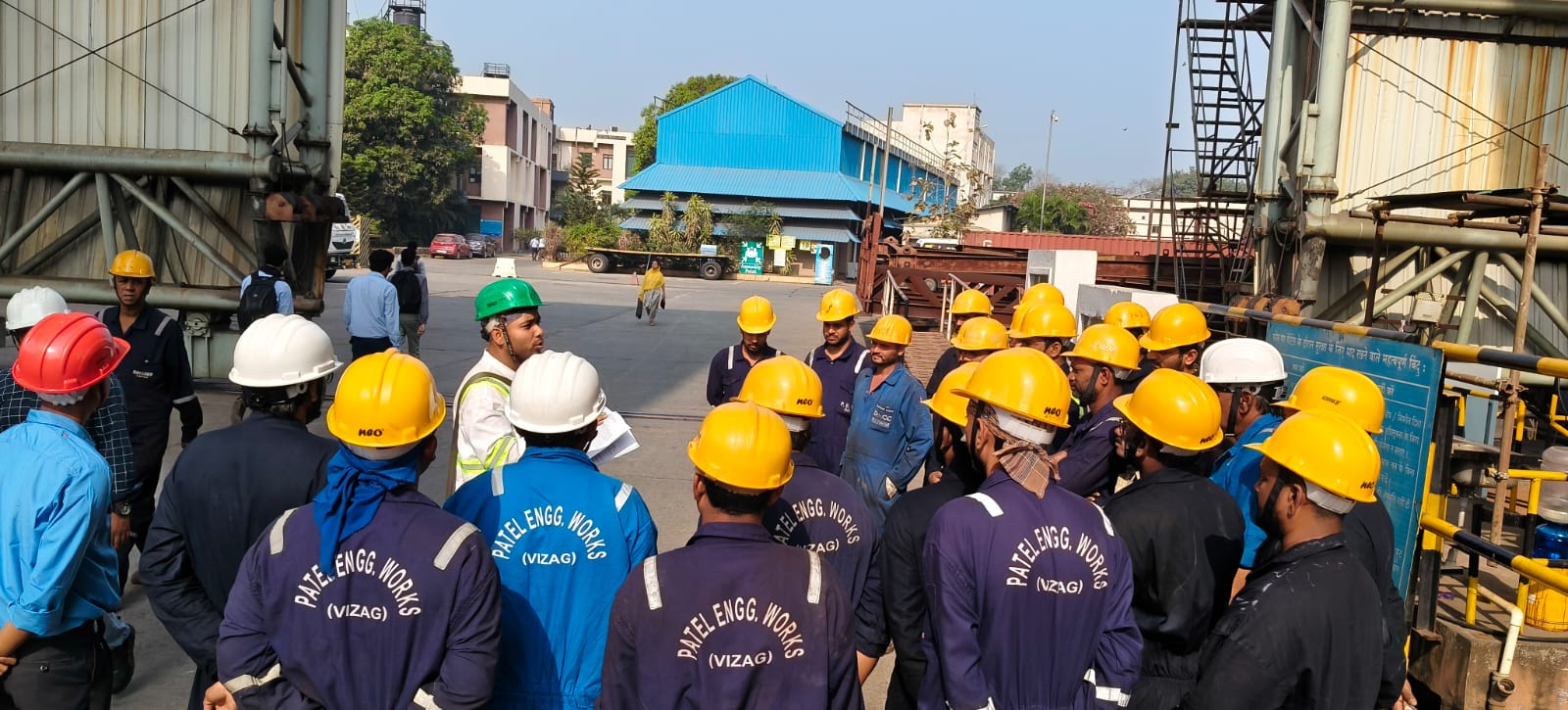 PEWV engineers and supervisors reviewing drawings on site
